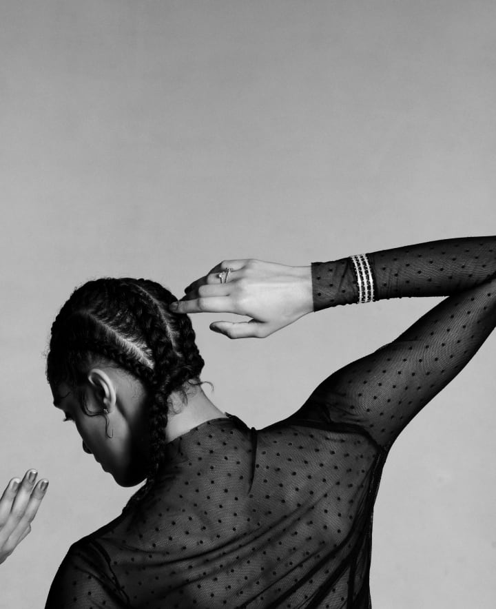 girl wears 3 beaded bracelets & 2 beaded rings of lab grown diamonds & 18k recycled gold for oscar massin jewelry